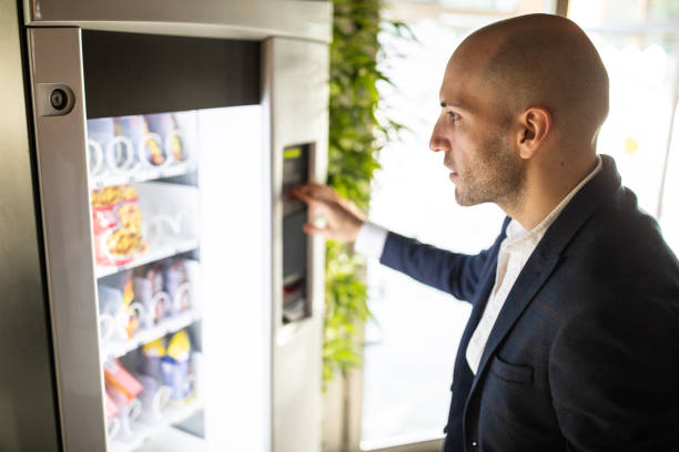 Man selecting a snack